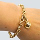 Ole Lynggaard; Bracelet of 14k gold, with heart charm and  Ole Lynggaard; Bracelet of 14k gold, with heart charm and